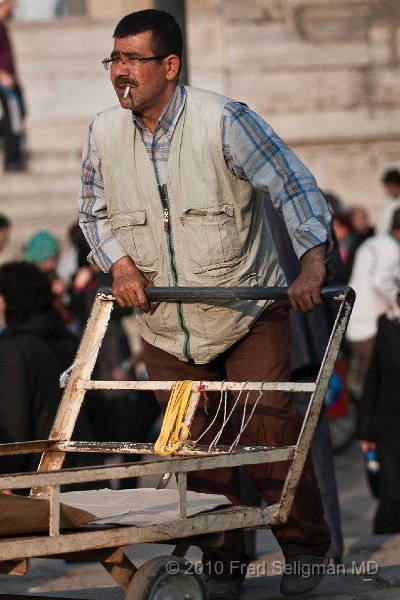 20100403_175716 D300 (1).jpg - Man at work near New Mosque